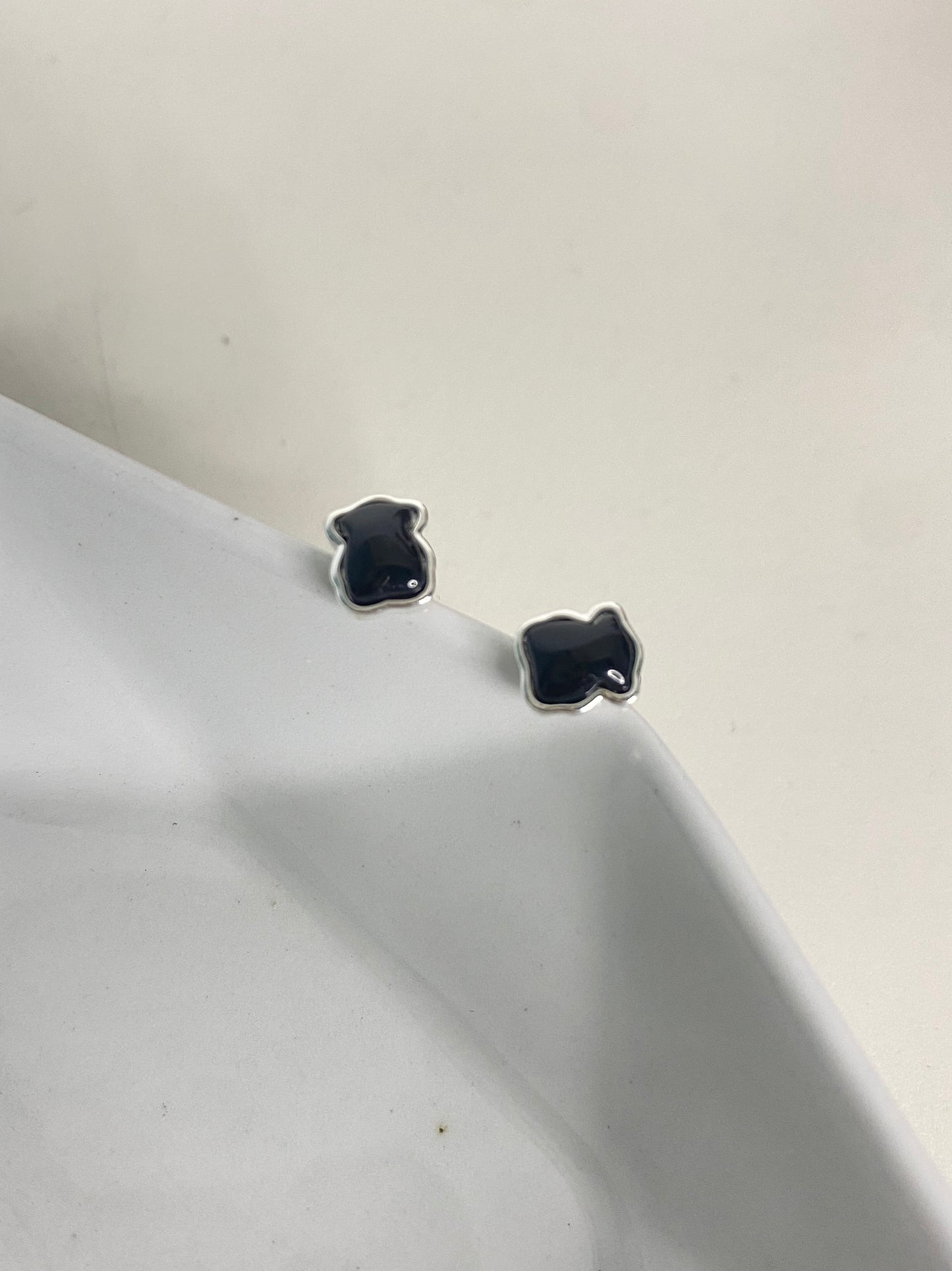 Aretes Tous negros
