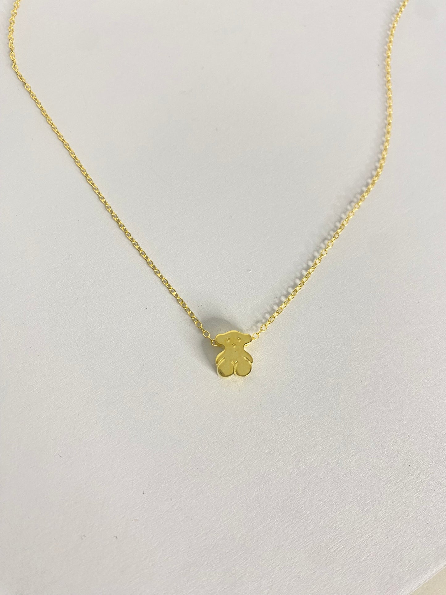 Collar dorado oso
