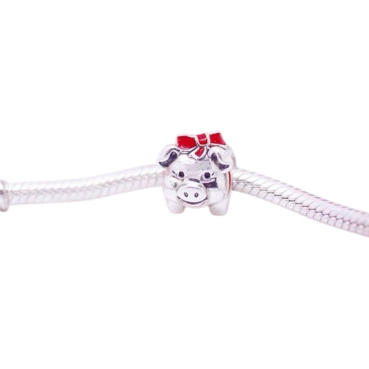 Charm cerdito alcancia
