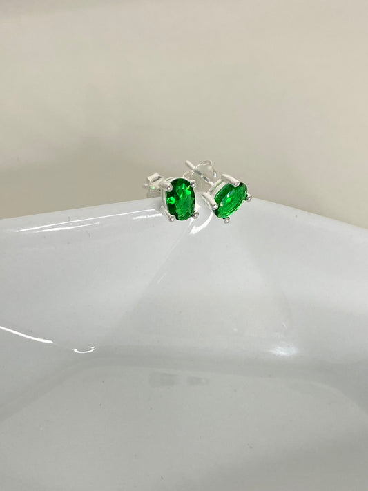Aretes puntos de luz verdes