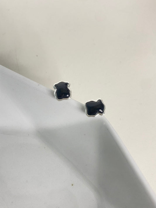 Aretes Tous negros