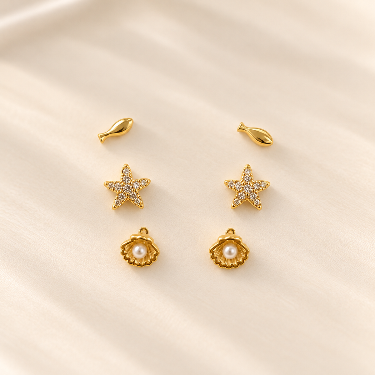 Set de aretes marinos dorados ✨