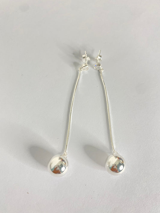 Aretes largos bolitas