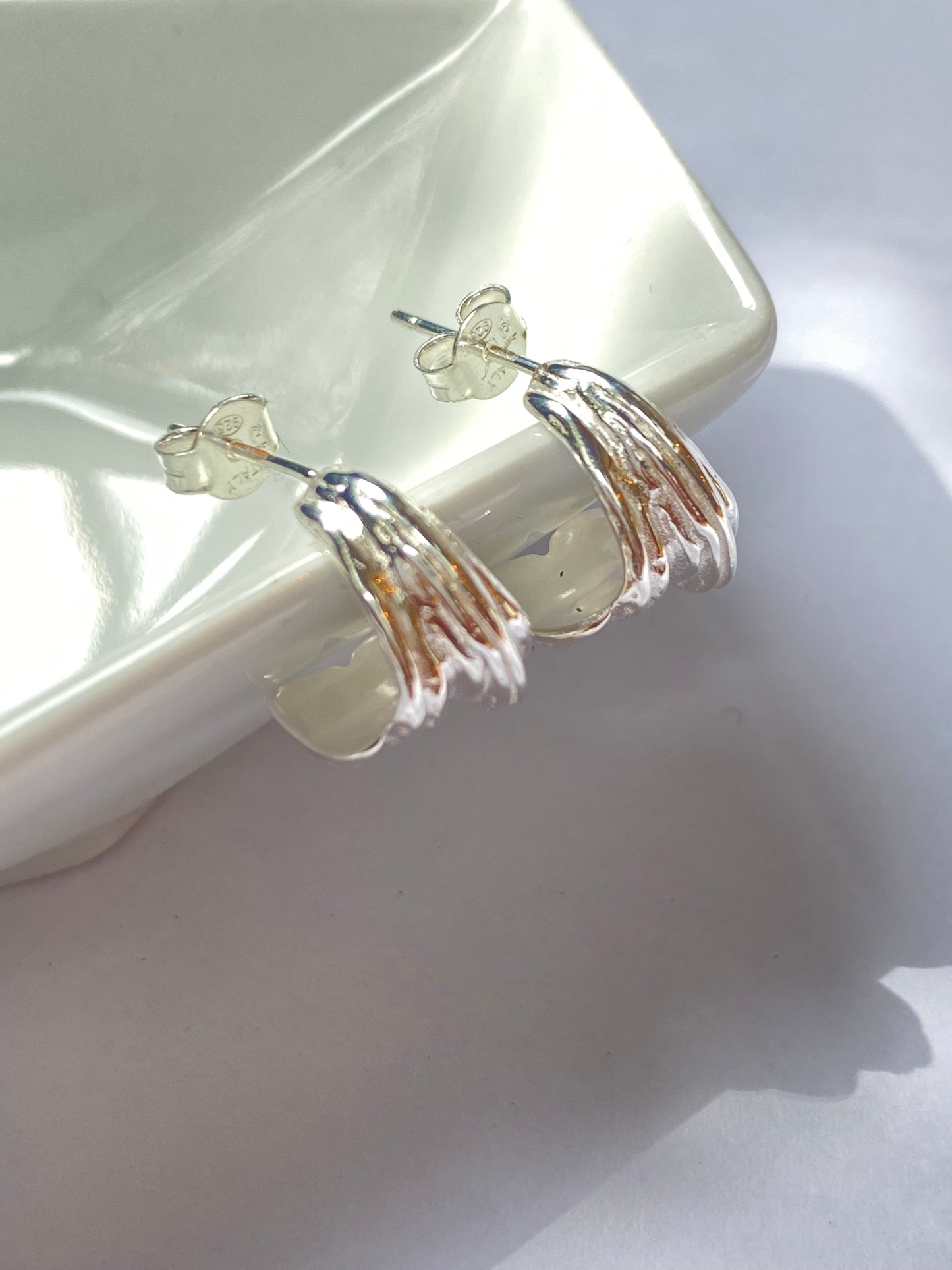 Aretes media lunas con diseño