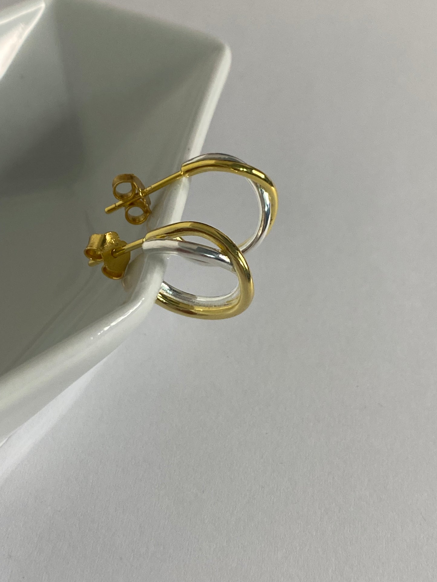 Semi argollas plata y dorado