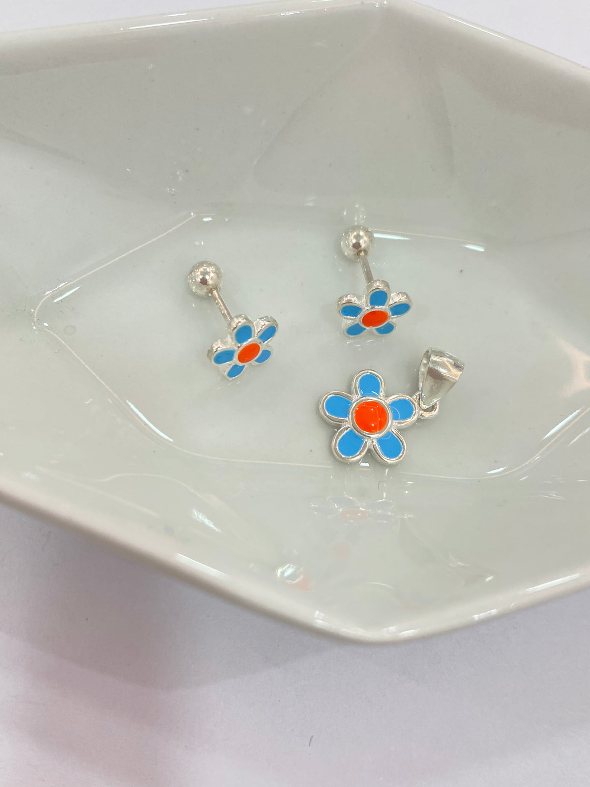 Juego de flor azul y naranja